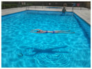 Woman Swimming in clean pool in Little Rock Arkansas